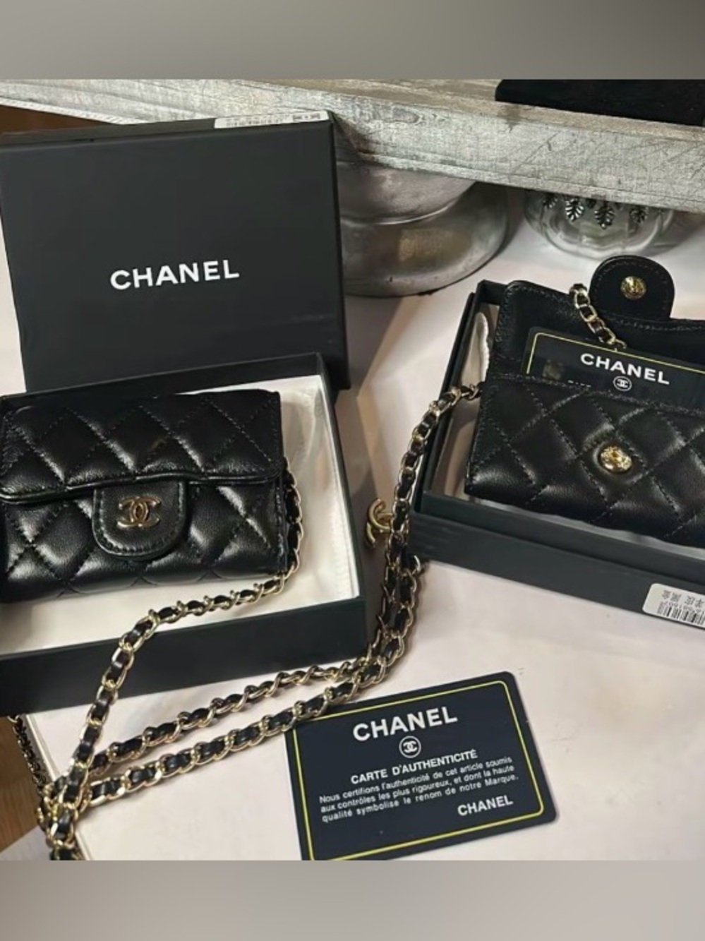 CHANEL Black Quilted Mini Wallet-on-Chain with Gold-Tone Hardware